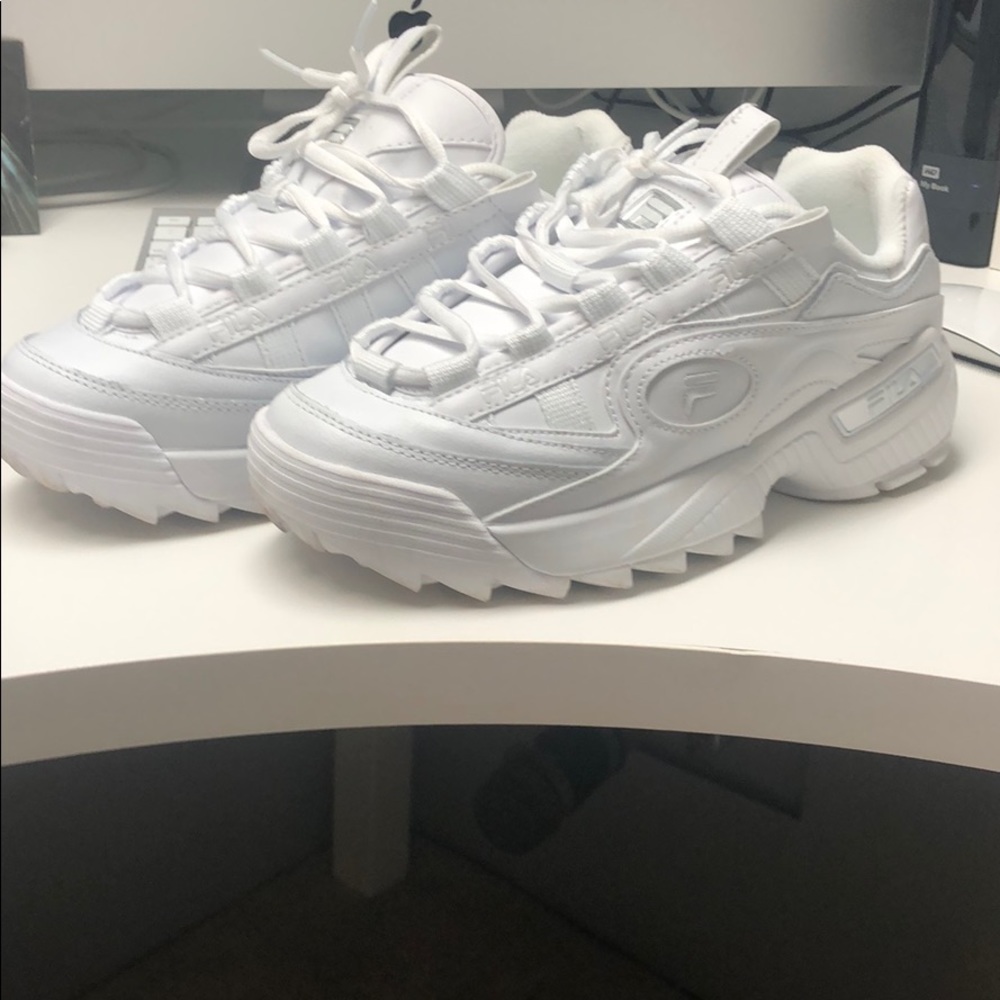New woman’s Fila sneakers brand new barely used.